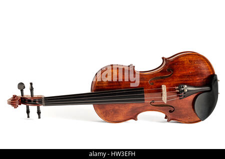 Reclined standard violin made of wood isolated on white Stock Photo