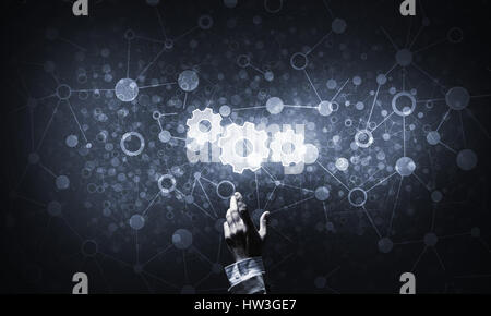 Technology conceptual image with gear digital symbol on dark bac Stock Photo