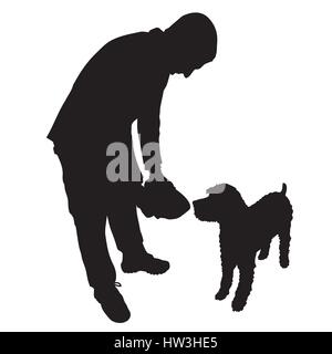 A man is about to feed a dog some food or water from a bowl Stock Vector