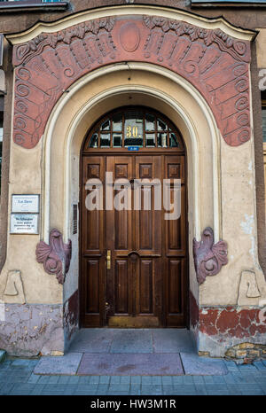 Wooden door in building on Gertrudes Street in Riga, capital city of Republic of Latvia Stock Photo
