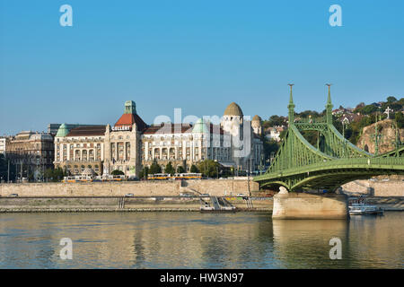 The famous Gellert Baths with Liberty Bridge across Danube, early in the morning Stock Photo