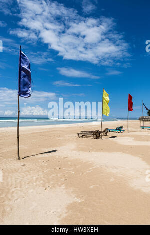 Colourful flags on the white sand beach at Kabalana, Ahangama, Sri Lanka Stock Photo