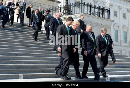 Washington, USA. 16th Mar, 2017. United States President Donald J. Trump (2-L) flanked by US House Speaker Paul Ryan (Republican of Wisconsin), US Representative Peter King (Republican of New York) third left, and the Taoiseach of Ireland Enda Kenny, right, walk down the steps of the Capitol after attending the Friends of Ireland Luncheon at the U.S Capitol on March 16, 2017 in Washington, DC. Credit: MediaPunch Inc/Alamy Live News Stock Photo