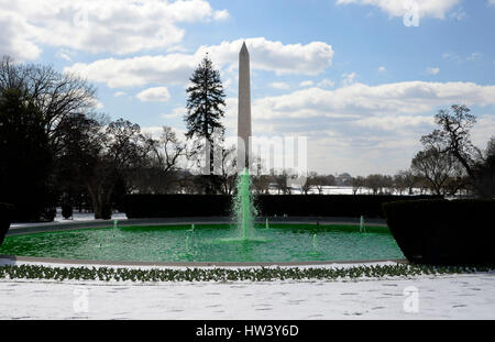 Washington, USA. 16th Mar, 2017. Fountain on the South side of the White House is dyed green for St. Patrick's Day in Washington, DC, on March 16, 2017 in Washington, DC. Credit: MediaPunch Inc/Alamy Live News Stock Photo