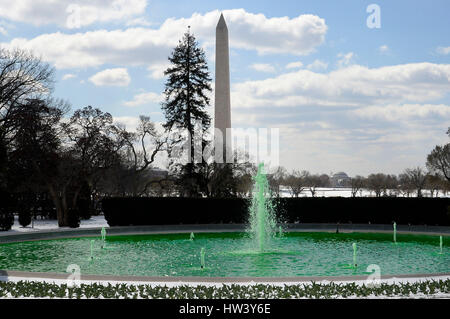 Washington, USA. 16th Mar, 2017. Fountain on the South side of the White House is dyed green for St. Patrick's Day in Washington, DC, on March 16, 2017 in Washington, DC. Credit: MediaPunch Inc/Alamy Live News Stock Photo