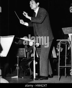 Mar. 14, 1965 - Japanese Conductor makes his London Debut with the London Symphony Orchestra tonight - Mr. Seiji Ozawa, from Tokyo associate conductor of the New York Philharmonic Orchestra, who at the age of 29, finds himself at the top of his career, will make his London debut when he conducts the London Symphony Orchestra at the Festival Hall this evening. Photo Shows: Mr. Ozawa pictured as he conducted the London Symphony Orchestra during rehearsals at the Festival Hall this morning. Keystone (Credit Image: © Keystone Press Agency/Keystone USA via ZUMAPRESS.com) Stock Photo