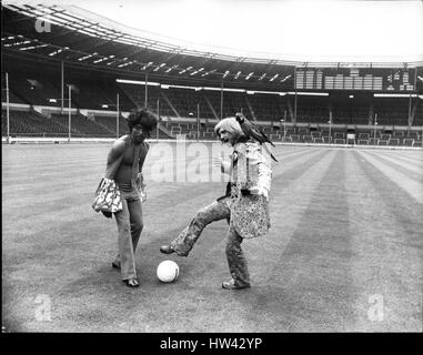 Aug. 08, 1972 - Preparations For The Rock N' Roll Festival At Wembley Stadium: Little Richard, who claims he is the King of Rock N' Roll and one of the stars of the Rock n' Roll Festival which opens at Wembley Stadium on Saturday Aug. 5th, gave a press conference at the Stadium today. Photo shows Little Richard (left) has a little kick around with Lord Sutch, another of the stars, on the famous Wembley pitch. (Credit Image: © Keystone Press Agency/Keystone USA via ZUMAPRESS.com) Stock Photo