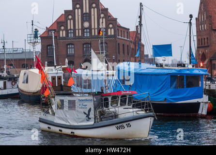 Wismar, Germany. 17th Mar, 2017. The Seeadler trawler enters the harbour in Wismar, Germany, 17 March 2017. The fishing industry in the state of Mecklenburg-Western Pomerania is currently threatened by a combination of sinking EU fishing quotas, low demand, and rising costs. The area used to support some 170 fishing operations; today only three remain. Photo: Jens Büttner/dpa-Zentralbild/dpa/Alamy Live News Stock Photo