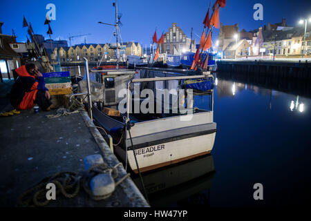 Wismar, Germany. 17th Mar, 2017. Fisherman Bodo Uhse on board the Seeadler trawler in the harbour in Wismar, Germany, 17 March 2017. The fishing industry in the state of Mecklenburg-Western Pomerania is currently threatened by a combination of sinking EU fishing quotas, low demand, and rising costs. The area used to support some 170 fishing operations; today only three remain. Photo: Jens Büttner/dpa-Zentralbild/dpa/Alamy Live News Stock Photo