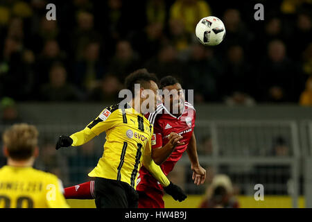 Dortmund. 17th Mar, 2017. Pierre-Emerick Aubameyang (L) of Dortmund fights for the ball during the German Bundesliga soccer match between Borussia Dortmund and FC Ingolstadt at the Signal Iduna Park in Dortmund, Germany on March 17, 2017. Credit: Joachim Bywaletz/Xinhua/Alamy Live News Stock Photo