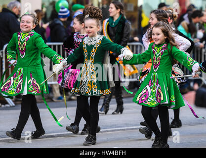New York, USA. 17th Mar, 2017. People participate in the St. Patrick's Day Parade in New York, the United States, on March 17, 2017. Hundreds of thousands of people gathered alongside New York's Fifth Avenue to watch the St. Patrick's Day Parade here on Saturday. Credit: Li Rui/Xinhua/Alamy Live News Stock Photo