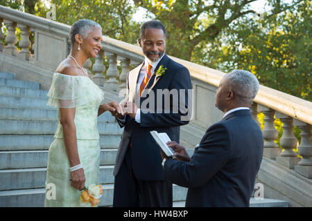 Wedding ceremony on stone staircase Stock Photo