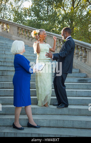 Wedding ceremony on stone staircase Stock Photo