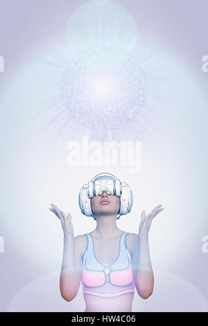 Woman using virtual reality helmet under pixelated sphere Stock Photo
