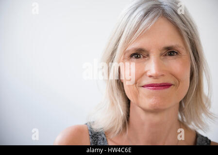 Portrait of smiling Caucasian woman Stock Photo