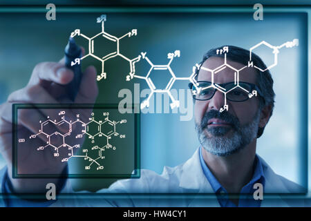 Hispanic scientist drawing chemical model on virtual screen Stock Photo