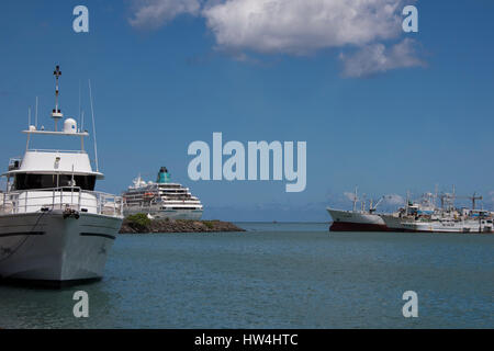 Mauritius, Capital city of Port Louis. Popular Le Caudan waterfront and harbor area. Cruise port with the ship Amadea docked in distance. Stock Photo