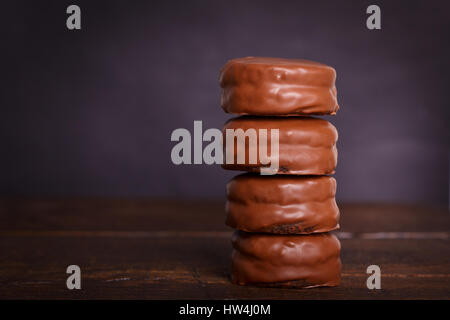 Brazilian honey cookie pao de mel on wooden background. Selective focus Stock Photo