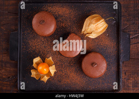 Brazilian honey cookie pao de mel on wooden background. Selective focus Stock Photo