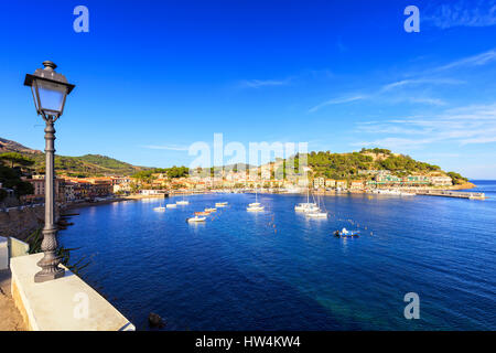 Elba island, Porto Azzurro village bay. Marina and street lamp. Tuscany, Italy, Europe Stock Photo