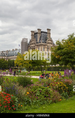 PARIS - JULY 15, 2014: Famous Tuileries garden (Jardin des Tuileries). Beautiful and popular public garden located between the Louvre Museum and the P Stock Photo