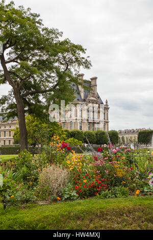 PARIS - JULY 15, 2014: Famous Tuileries garden (Jardin des Tuileries). Beautiful and popular public garden located between the Louvre Museum and the P Stock Photo