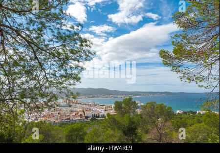 Hill side view of St Antoni de Portmany, Ibiza, on a clearing day in November, kindly warm breeze in autumn,  Balearic Islands, Spain. Stock Photo