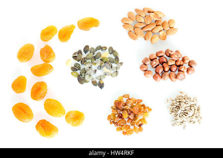 Delicacies, different spices scattered on the white background. Stock Photo
