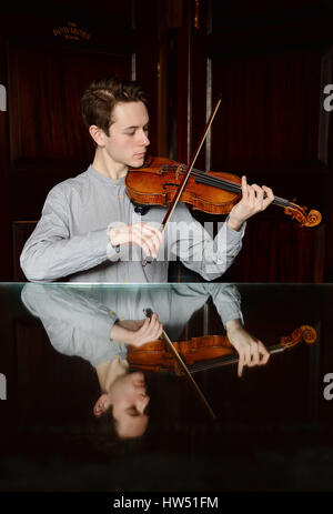 Violinist Samuel Staples plays a 1684 Stradivari violin known as the ...