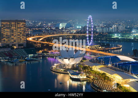 Singapore business district skyline in night at Marina Bay, Singapore. Stock Photo