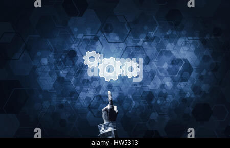 Technology conceptual image with gear digital symbol on dark bac Stock Photo
