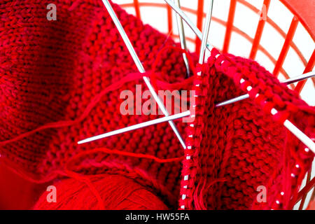 Knitting needles, woolen thread Stock Photo