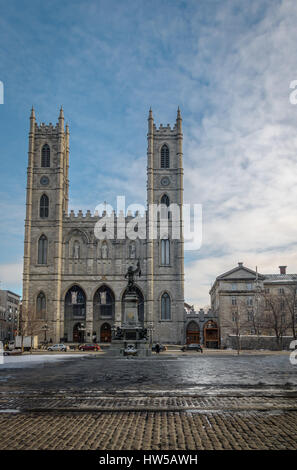 Basilica of Notre-Dame of Montreal and Place d'Armes - Montreal, Quebec, Canada Stock Photo