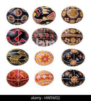 There are pysankas with traditional Ukrainian ornaments and symbols. The Easter eggs are decorated with a pattern using a wax-resist method. Stock Photo