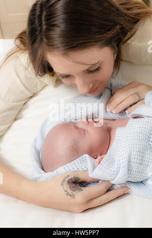 Mother with her new born baby. Stock Photo