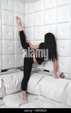 Brunette dancer in a club setting Stock Photo