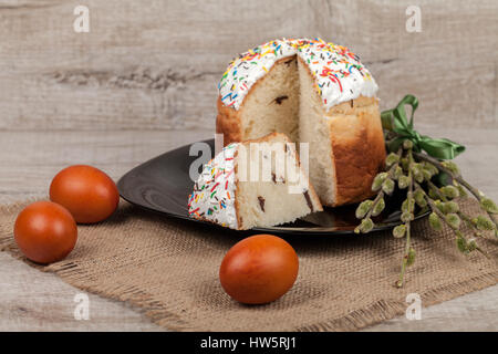 Homemade Easter cake and painted eggs on the table Stock Photo