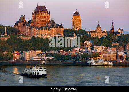 Canada, Quebec province, Quebec City, the Old Quebec listed as World Heritage by UNESCO, Old Quebec at sunrise, the ferry across the St. Lawrence River between Quebec City and Lévis Stock Photo