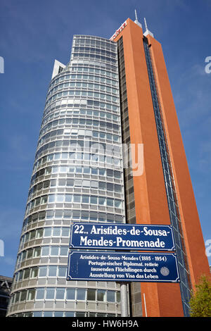 Vienna, Austria - August 14, 2016: Aristides de Sousa Mendes Promenade street sign in front of Andromeda Tower at the Austria Center Vienna (ACV). Stock Photo