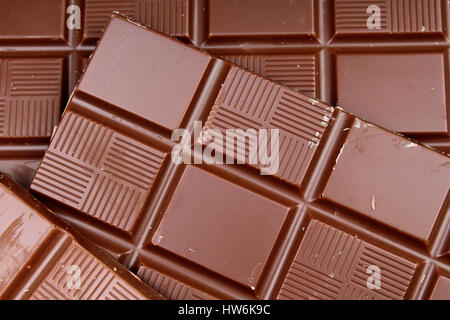 Milk chocolate dark chocolate bars as background. Stock Photo