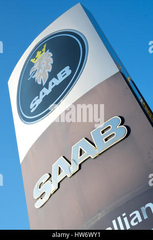 Saab dealership sign against blue sky Stock Photo