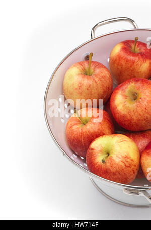 Apples isolated in a colander Stock Photo - Alamy
