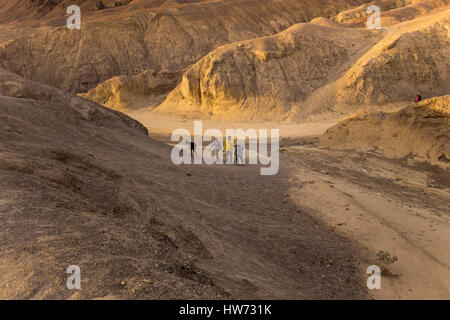 people, tourists, visitors, Artists Palette, Artist Drive, Black Mountains, Death Valley National Park, Death Valley, California Stock Photo