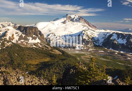View of Garibaldi and Table Meadows from summit of Mt Price above Garibaldi Lake in Coast Mountains of British Columbia, Canada Stock Photo