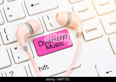 concepts of download music, with message on enter key of keyboard. Stock Photo