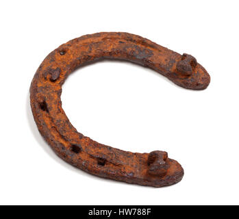 Old rusty horseshoe. Isolated on white background. Stock Photo