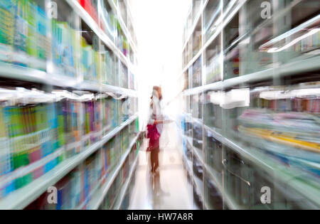 Library shelves, a large number of books. Stock Photo