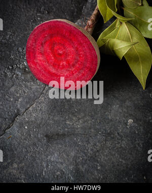 Beets cut on a black stone background. Lots of space for text. Stock Photo