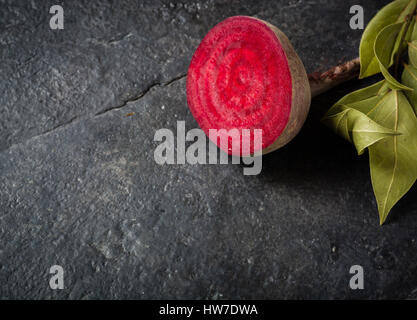 Beets cut on a black stone background. Lots of space for text. Stock Photo