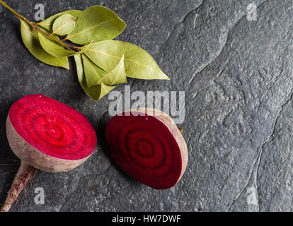 Beets cut on a black stone background. Lots of space for text. Stock Photo